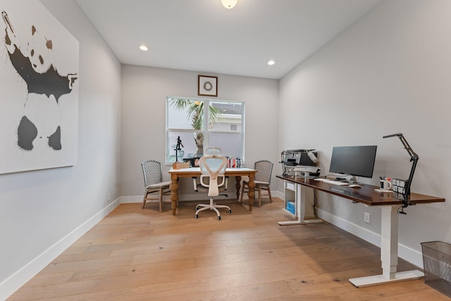 home office featuring light hardwood / wood-style floors