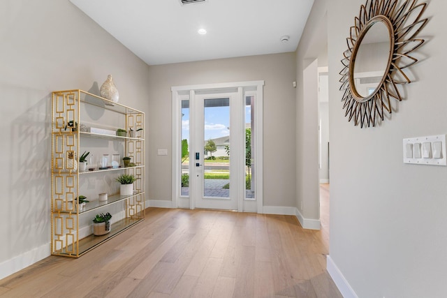 doorway featuring light hardwood / wood-style floors