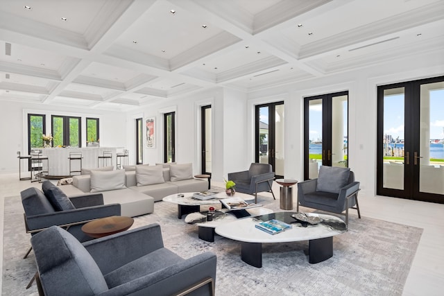 living room with coffered ceiling, french doors, and beam ceiling