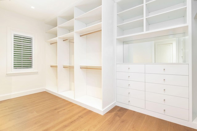 walk in closet featuring wood-type flooring