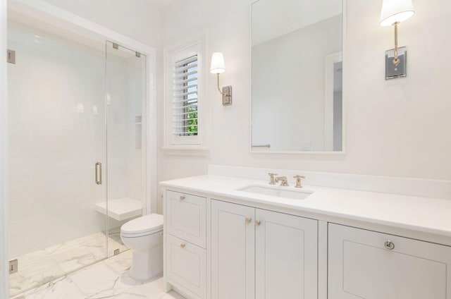 bathroom with toilet, a shower with door, and vanity