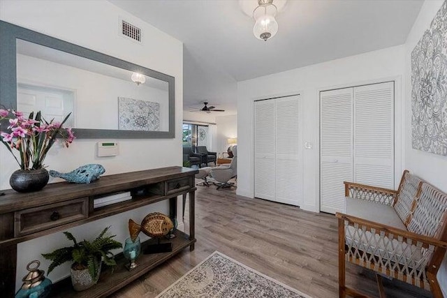 corridor featuring light hardwood / wood-style flooring