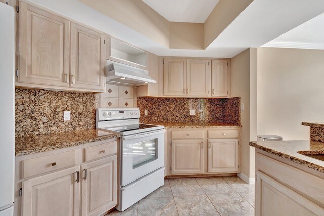 kitchen with ceiling fan, sink, light stone countertops, backsplash, and light tile patterned floors