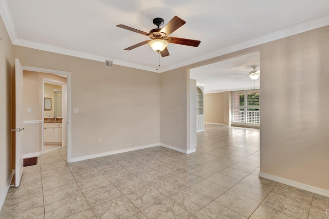 tiled empty room featuring ceiling fan, sink, crown molding, and built in shelves