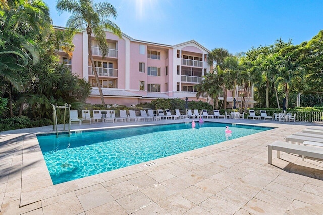 view of swimming pool featuring a patio area