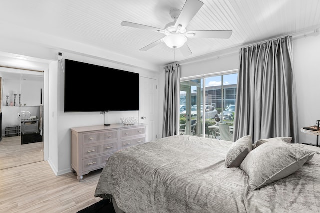 bedroom featuring light wood-type flooring, ceiling fan, and access to exterior