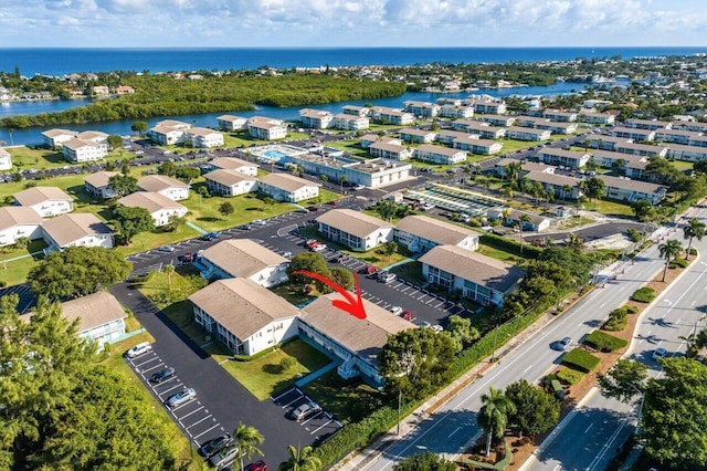 drone / aerial view with a water view