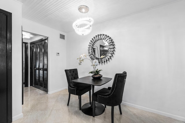 dining room featuring an inviting chandelier