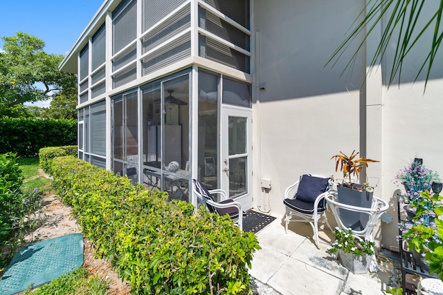 exterior space featuring a sunroom