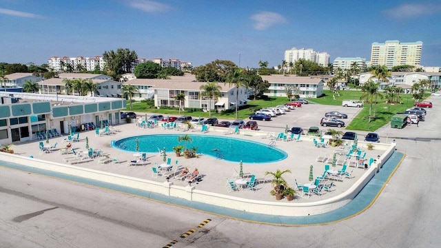 view of swimming pool with a patio area