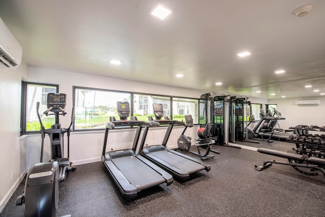 exercise room with an AC wall unit