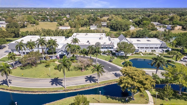 bird's eye view with a residential view and a water view