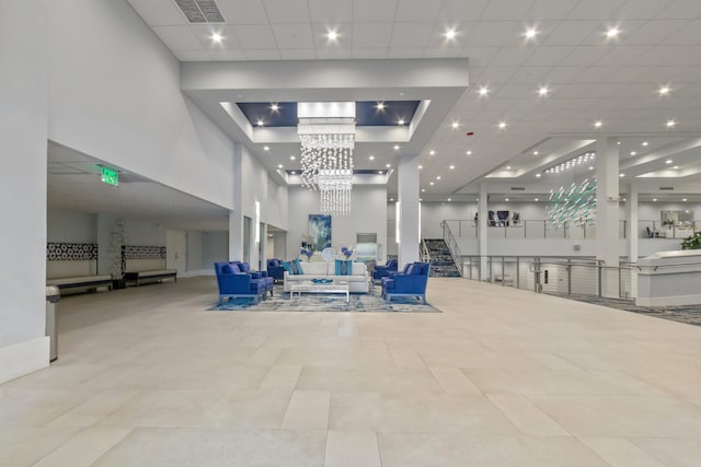 building lobby with stairs and visible vents