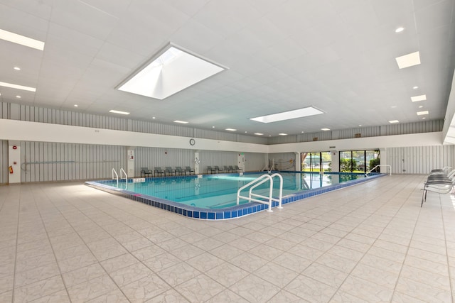 view of pool with a skylight