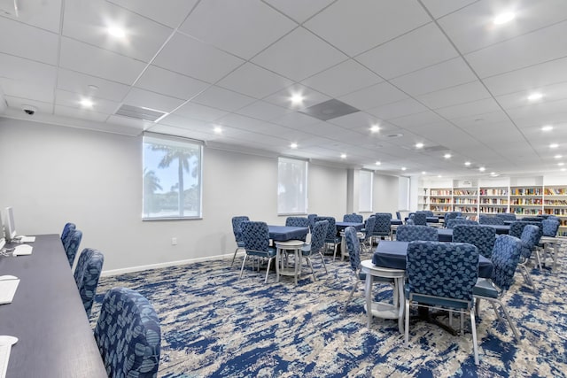 dining space with carpet, baseboards, and visible vents