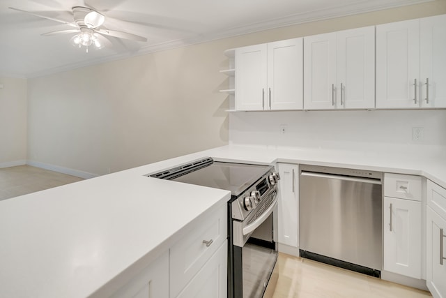 kitchen with ceiling fan, crown molding, white cabinets, and appliances with stainless steel finishes