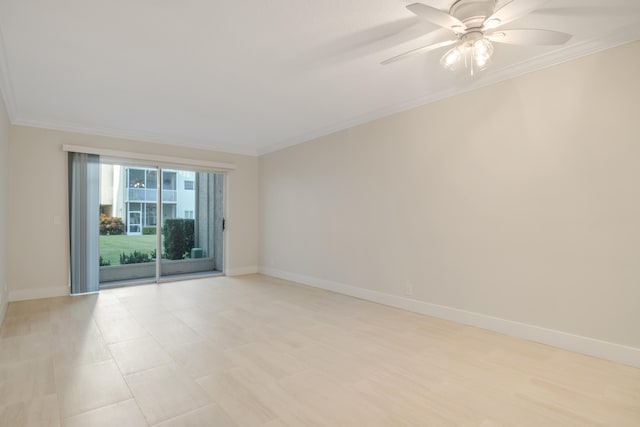 unfurnished room with ceiling fan and ornamental molding