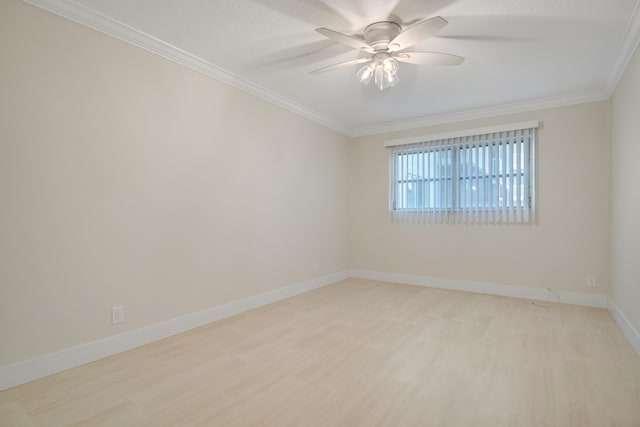 empty room featuring crown molding, ceiling fan, and light hardwood / wood-style floors