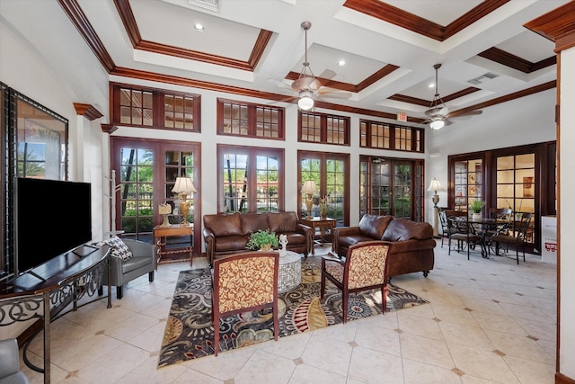 tiled living room featuring coffered ceiling, a towering ceiling, beam ceiling, ceiling fan, and french doors