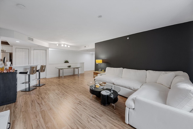 living room with light hardwood / wood-style floors