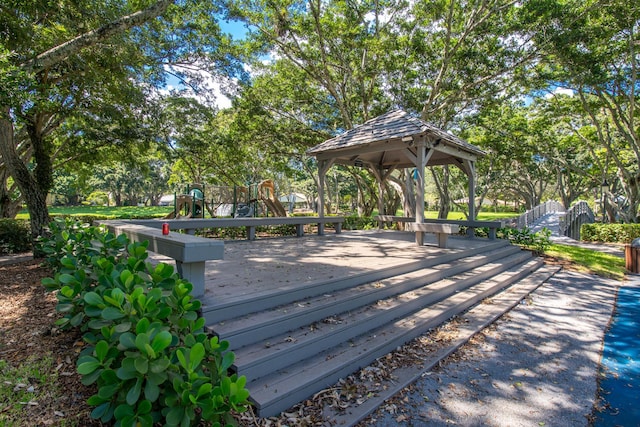 view of property's community featuring a playground and a gazebo