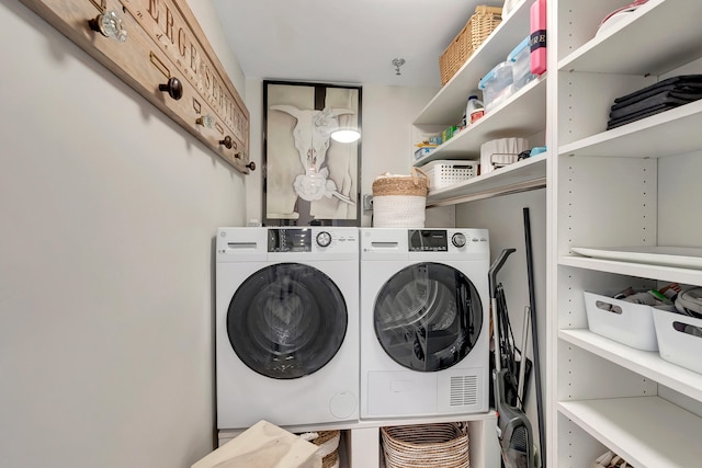 washroom featuring independent washer and dryer