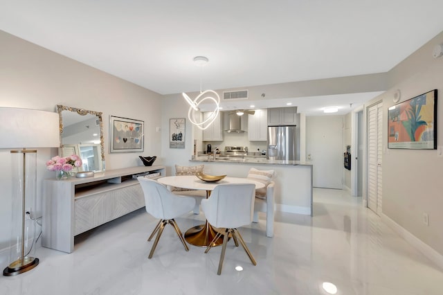 dining room featuring sink