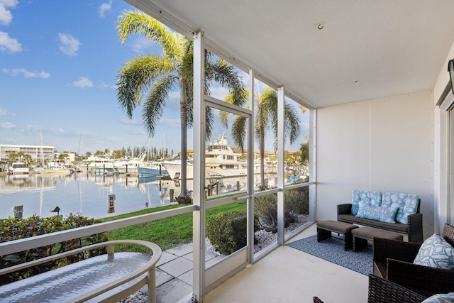 sunroom with a water view