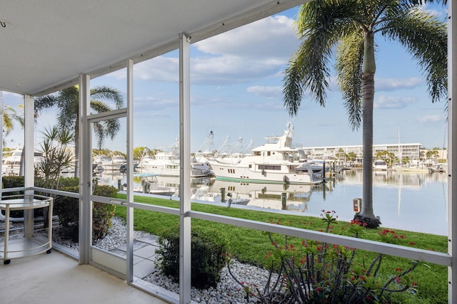 sunroom with a water view