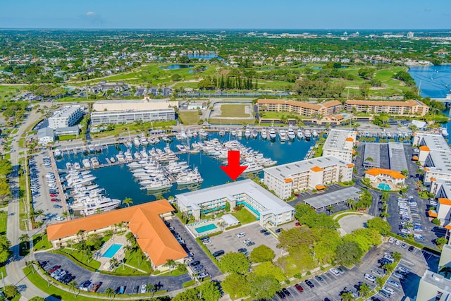 birds eye view of property featuring a water view