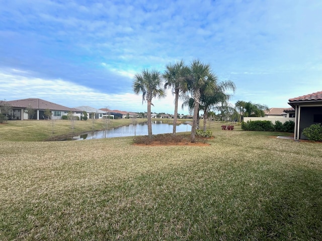 view of yard with a water view