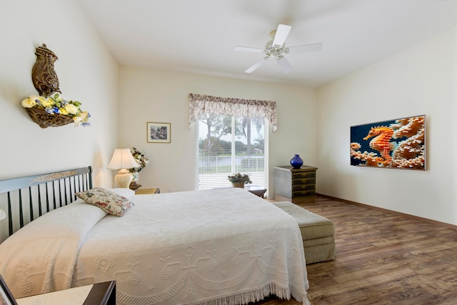 bedroom with wood-type flooring and ceiling fan