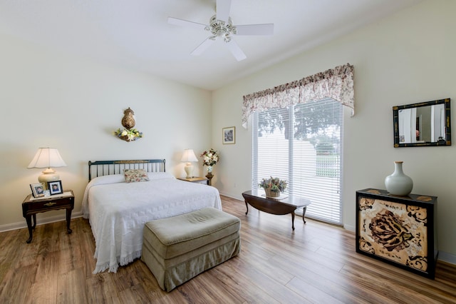 bedroom featuring hardwood / wood-style flooring and ceiling fan