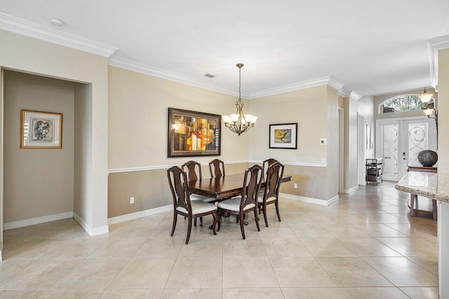 dining area with ornamental molding, a notable chandelier, light tile patterned flooring, and french doors