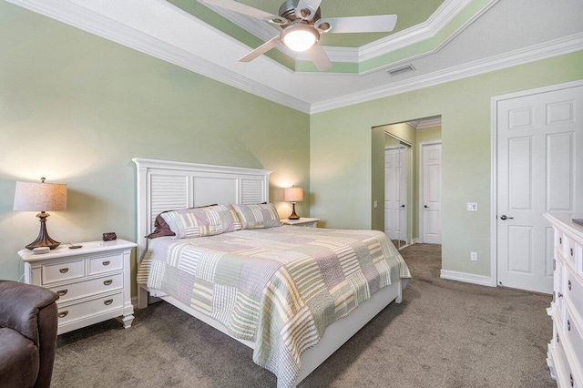 carpeted bedroom with crown molding and ceiling fan