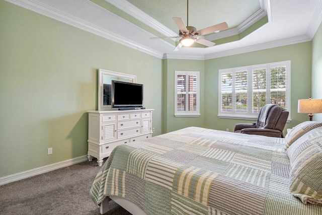 carpeted bedroom with a textured ceiling, crown molding, and ceiling fan