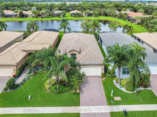 drone / aerial view with a water view