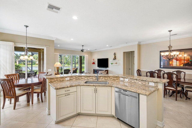 kitchen with ceiling fan with notable chandelier, dishwasher, decorative light fixtures, and sink