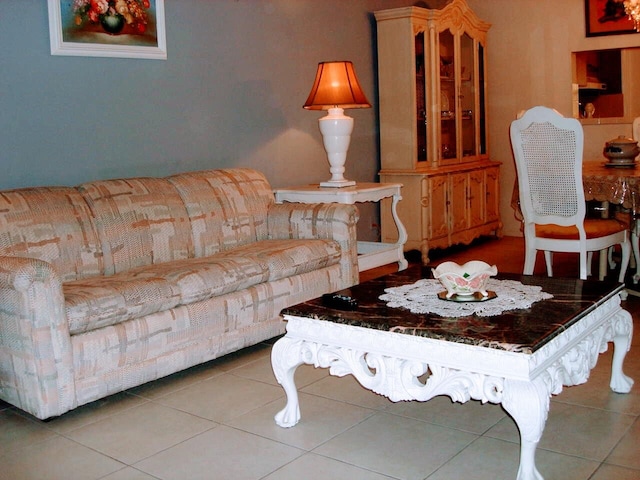 living room with light tile patterned floors