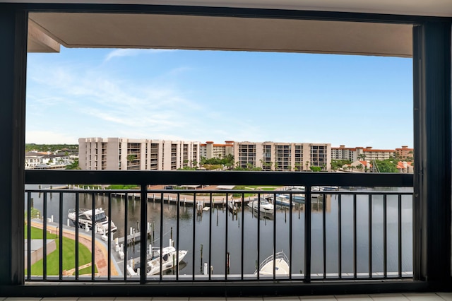 balcony featuring a water view