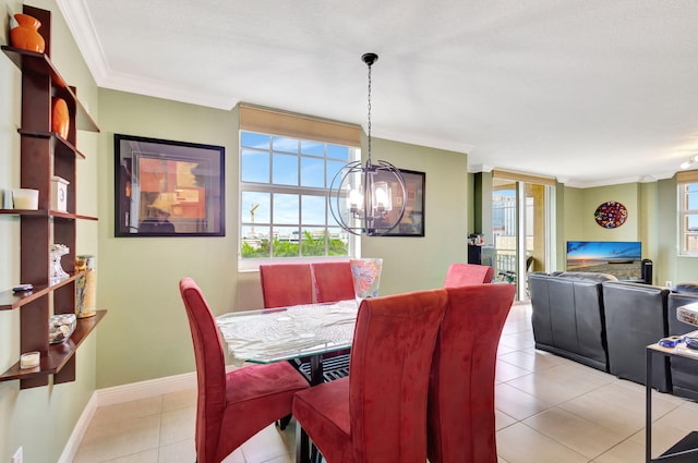 dining room featuring crown molding, an inviting chandelier, and light tile patterned floors