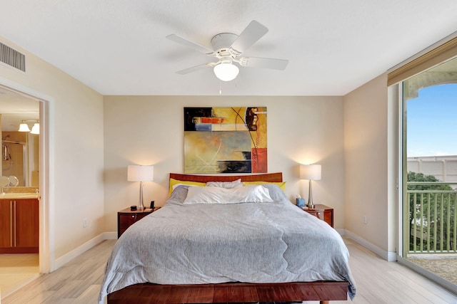 bedroom featuring light wood-type flooring, access to outside, ceiling fan, and ensuite bathroom