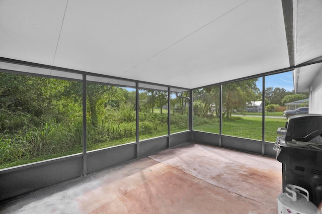 unfurnished sunroom with a healthy amount of sunlight