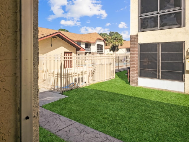 view of yard featuring fence