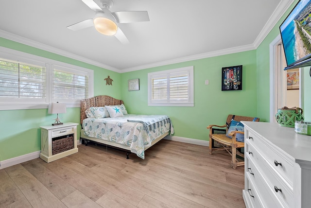 bedroom featuring ceiling fan, crown molding, and light wood-type flooring