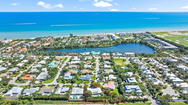 drone / aerial view featuring a water view