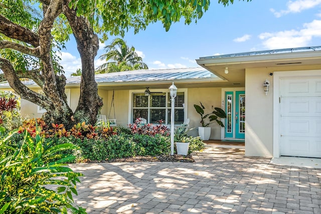 entrance to property with a garage