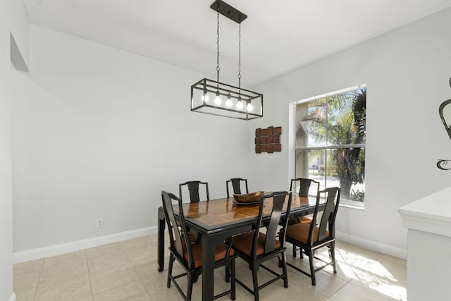 dining area with light tile patterned floors