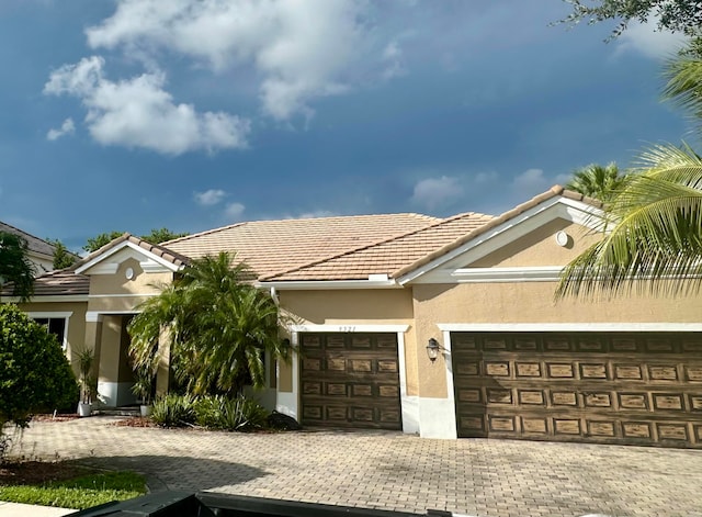 view of front of home with a garage