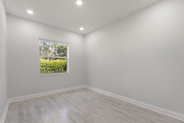 empty room with light wood-type flooring